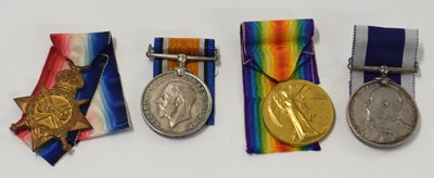 Lot 78 - First World War Naval medal group of four,...