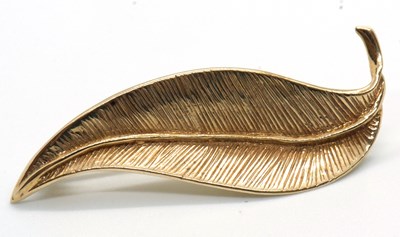 Lot 88 - A 9ct leaf brooch, the curved pointed leaf...
