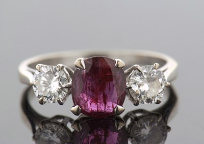 Lot 321 - An 18ct white gold ruby and diamond ring, the...