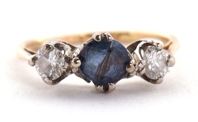 Lot 51 - A sapphire and diamond ring, the round mixed...