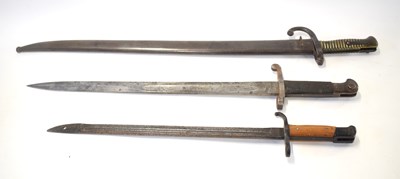 Lot 220 - Three bayonets to include French model 1866...