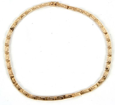 Lot 202 - A Greek key necklace, the slightly curved...