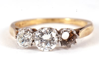 Lot 79 - A three stone diamond ring, the three...