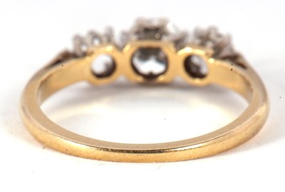 Lot 79 - A three stone diamond ring, the three...