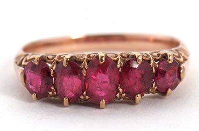 Lot 14 - A five stone ruby ring, the five graduated...