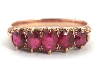 Lot 45 - A five stone ruby ring, the five graduated...