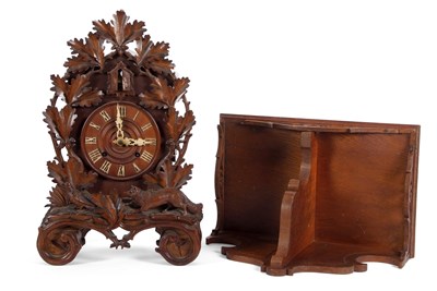 Lot 356 - A Black Forest cuckoo clock of typical form,...