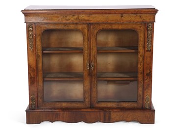 Lot 371 - A Victorian walnut veneered bookcase cabinet...