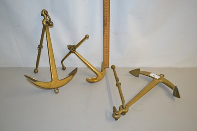 Lot 16 - Three small brass anchors