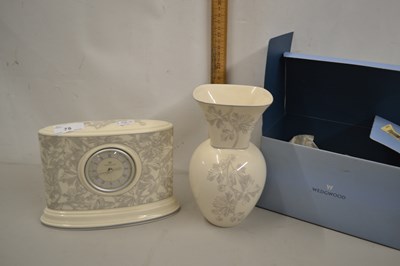 Lot 75 - Wedgwood Interiors mantel clock together with...