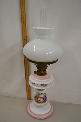 Lot 84 - Oil lamp with a milk glass body with painted...