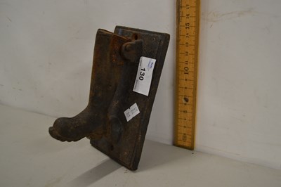 Lot 130 - An iron boot shaped door knocker
