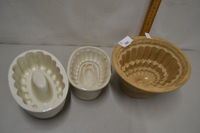 Lot 151 - Three various ceramic jelly moulds
