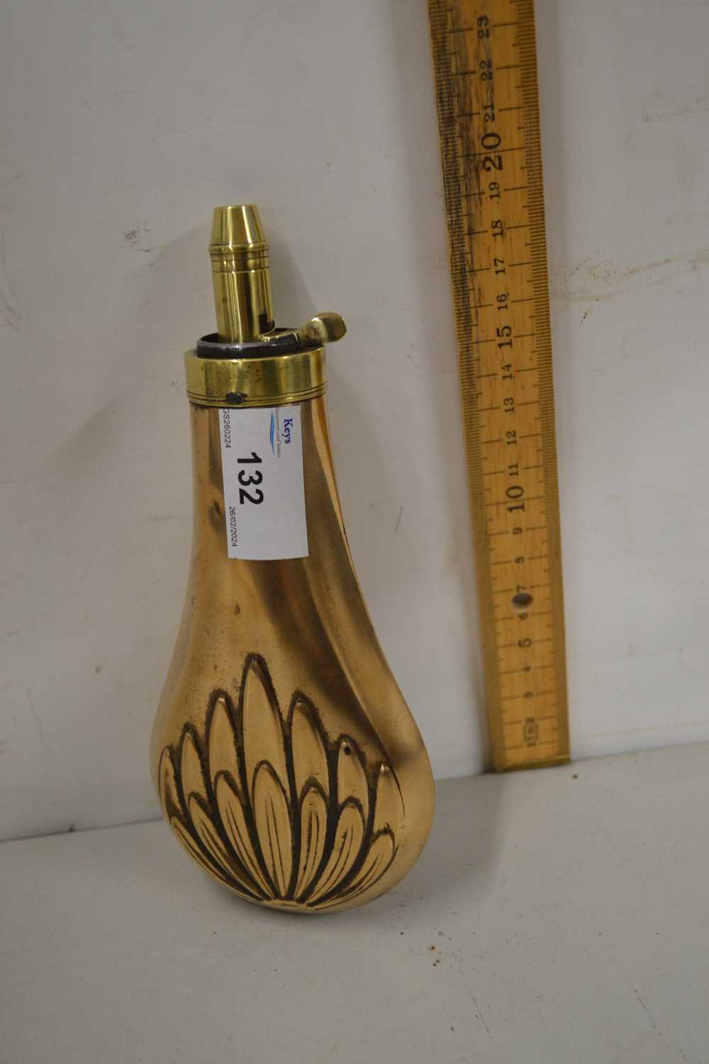 Lot 132 - Copper and brass mounted powder flask