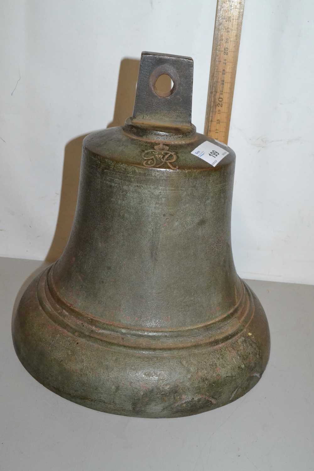 Lot 199 - Small cast bronze bell bearing cypher for...