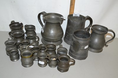 Lot 204 - Collection of various small pewter measures...