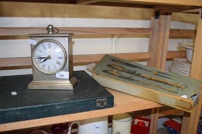 Lot 546 - White metal mantel clock together with an...