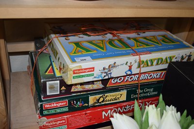 Lot 566 - Four games to include Monopoly, Cluedo, Go for...