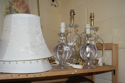 Lot 576 - Four table lamps and two embroidered and...