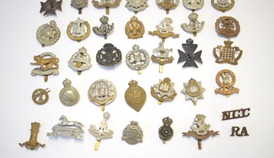Lot 177 - Quantity of cap badges to include 8th city of...