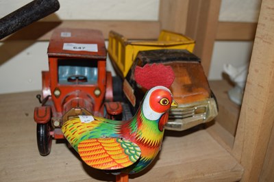 Lot 647 - A tin plate cockerel and tin plate car and a...