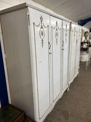 Lot 230 - 20th Century French style triple door wardrobe...