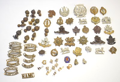 Lot 178 - Quantity of 20th century cap badges and brass...
