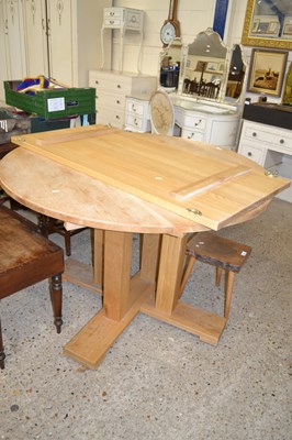 Lot 246 - Modern light oak pedestal extending dining table