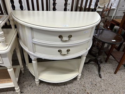 Lot 261 - Cream finish demi lune hall table with two...