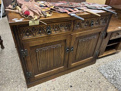 Lot 317 - An Old Charm dark oak small side cabinet with...