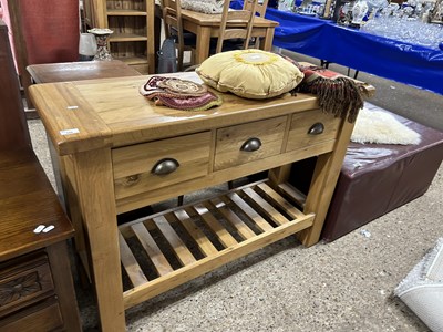 Lot 320 - A modern light oak kitchen side table, 118cm wide