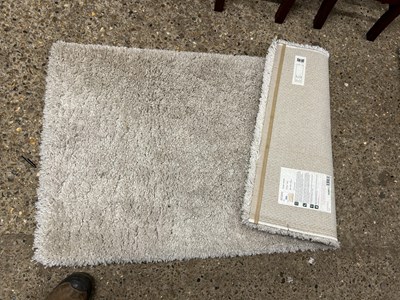 Lot 323 - A Dunelm Slumber Ivory rug, 80 x 50cm