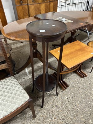 Lot 333 - A circular two tier plant stand