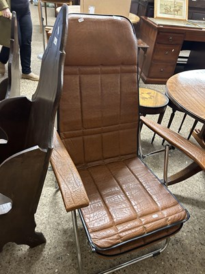 Lot 339 - Leatherette upholstered metal framed armchair