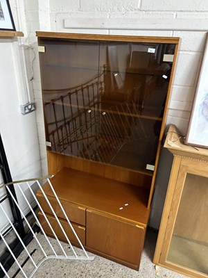 Lot 361 - Mid Century teak bookcase cabinet with smoked...