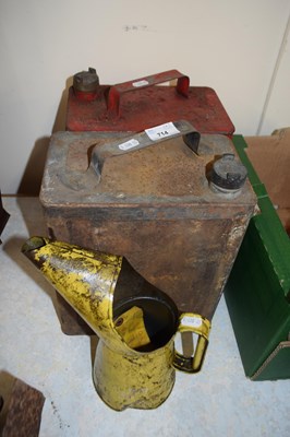 Lot 714 - Three of vintage oil cans