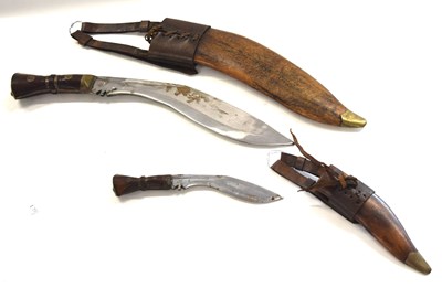 Lot 221 - Two Reproduction British Army issue Kukri's...
