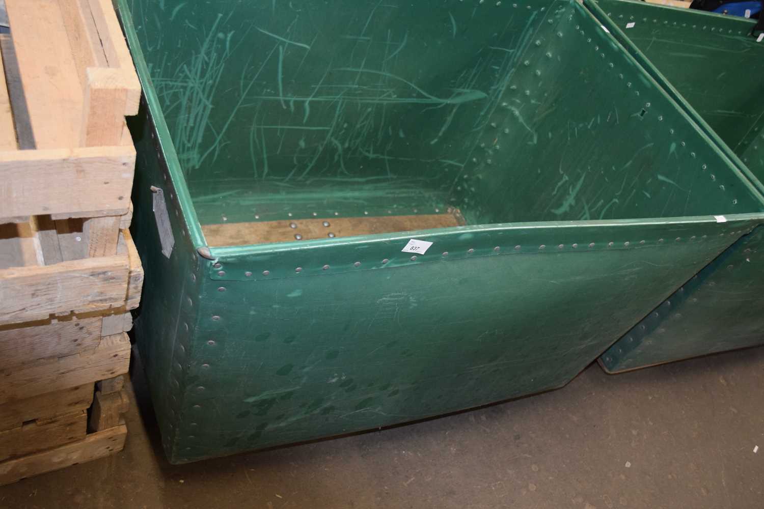 Lot 837 Plywood and green plastic laundry bin on