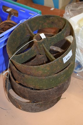 Lot 874 - Four cast iron wheels