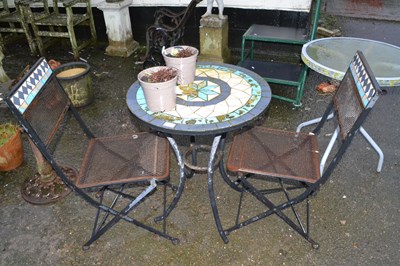 Lot 380 - Mozaic topped garden table and two chairs