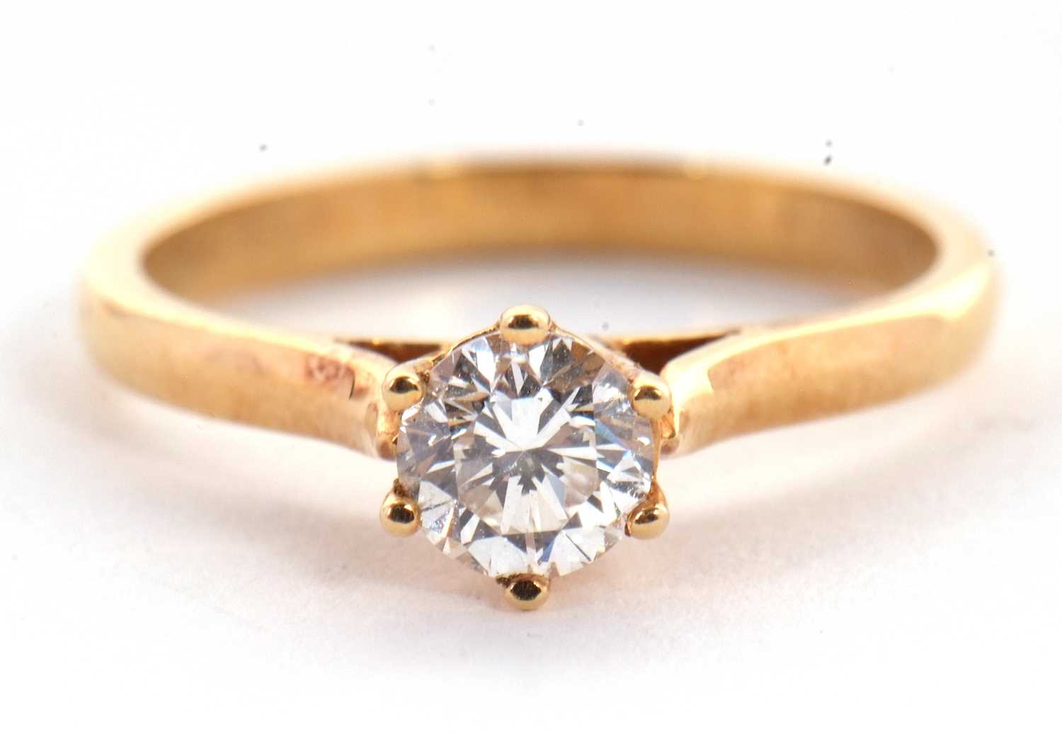 Lot 4 - A diamond solitaire ring, the round brilliant...