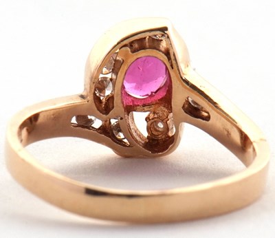 Lot 48 - A 14k ruby and diamond ring, the central four...