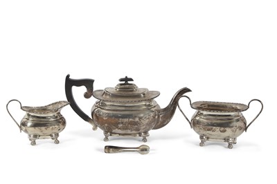 Lot 214 - George V silver three piece tea service of...