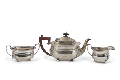 Lot 219 - A George VI silver three piece tea service of...