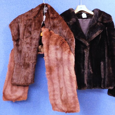 Lot 94 - A lady's cropped faux fur jacket together with...