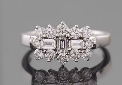 Lot 326 - A diamond cluster ring, set with three...