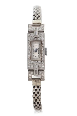 Lot 293 - An Art Deco precious metal and diamond ladies...