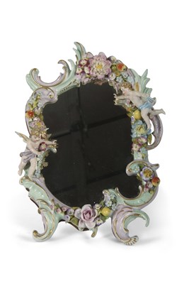 Lot 257 - A continental porcelain mirror the porcelain...