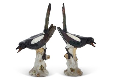 Lot 34 - A pair of continental porcelain models of...