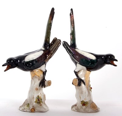 Lot 34 - A pair of continental porcelain models of...